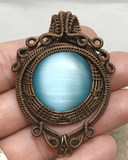 Handmade Oxidized Copper Wire Woven & Blue Fiber Optic Glass Pendant